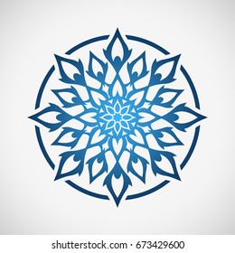 Round decorative ornament. Blue star. Blue flower. Abstract snowflake.