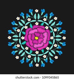 Round embroidered floristic decorative composition. Ethnic style satin stitch needlework illustration. Bunch of flowers summer motive. Vintage bouquet vector embroidery bloom design template.