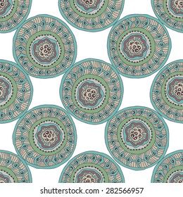 Round ethnic ornaments in the style of doodle.