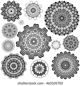 Round flower ornament in black and white, zentangle style.