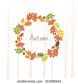 Round frame of autumn leaves, pine cons, Rowan and acorns