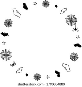 Round frame with black bat and spider