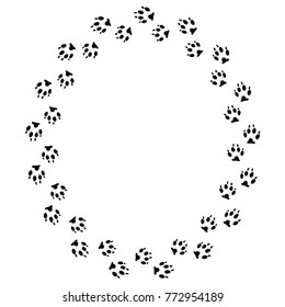 Round frame with black dog track isolated on white background. Animal footprint silhouette. Border with paw print.