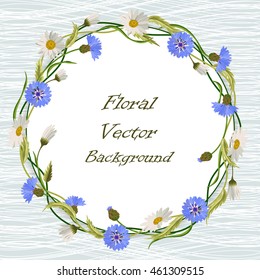 Round frame with blue cornflowers, daisies and green leaves. Vector illustration.