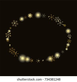 Round frame or border Christmas background with random scatter falling gold snowflakes and yellow blurred lights isolated on black.