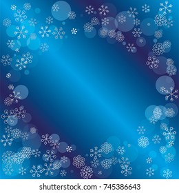 Round frame or border Christmas background with random scatter falling silver snowflakes and blue polka dots on a navy blue background.