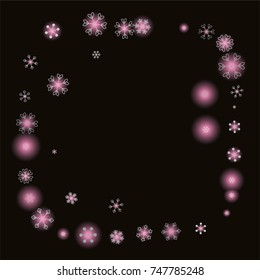 Round frame or border Christmas background with random scatter falling silver snowflakes and pink blurred lights isolated on black