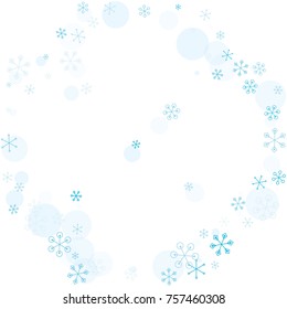 Round frame or border Christmas background with random scatter falling turquoise snowflakes and blue polka dots isolated on white.