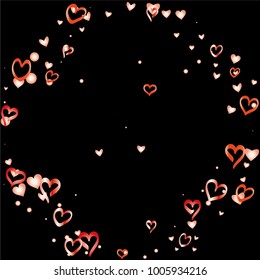 Round frame or border Valentines day background with random hand drawn falling red hearts isolated on black.