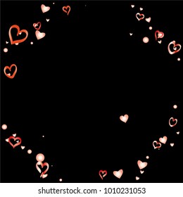 Round frame or border Valentines day background with random hand drawn falling red hearts isolated on black.
