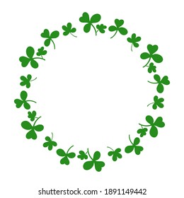 Round frame with clover leaves.Magical plant. Decoration for St. Patrick's Day with trefoils and quatrefoils. Shamrock. Irish story. Isolated on white. Vector illustration.