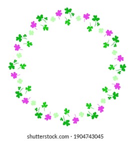 Round frame with clover leaves.Magical plant. Decoration for St. Patrick's Day with trefoils and quatrefoils. Shamrock. Irish story. Isolated on white.