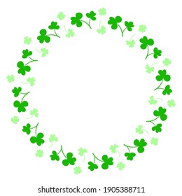 Round frame with clover leaves.Magical plant. Decoration for St. Patrick's Day with trefoils and quatrefoils. Shamrock. Irish story. Isolated on white.