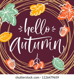 Round frame of colorful autumn leaves, acorns and hand written lettering "Hello Autumn". Vector illustration for posters, cards, invitations and more.