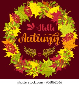 Round frame of colorful autumn leaves and hand written lettering "Hello Autumn". Autumn wreath. Vector illustration for posters, cards, invitations and more.