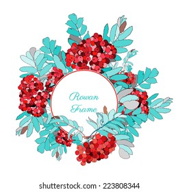 Round frame decorated with rowan-berries, in cool colors