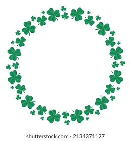 Round frame of emerald shamrocks. Wreath made from confetti clovers. Decorative element for St. Patrick's Day design. Vector illustration