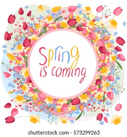 Round frame with flowers and calligraphy phrase Spring is coming. For spring design and advertisements.