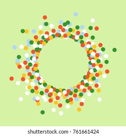 Round frame made of colored confetti. Bright background. Festive confetti.