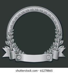 Round frame made of silver, decorated with different jewelry elements and silver ribbon