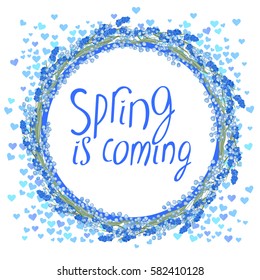 Round frame with pretty flowers dandelions and text Spring is coming. Festive floral circle for your season design.