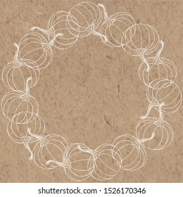 Round frame with pumpkins and place for text on kraft paper. Vector illustration. Perfect for invitations, greeting cards or as an element of your design.