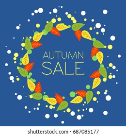 Round frame with the text "Autumn sale". A wreath of colorful leaves and chaotic dots on a blue background. Sale vector banners