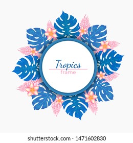 Round frame of tropical leaves in blue and pink colors and flowers