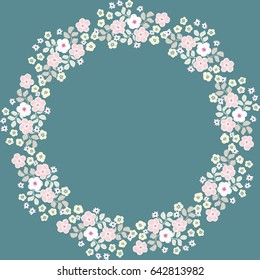 Round frame from wild charming flowers. Wreath. Greeting card template. Design artwork for the poster, invitation, calendars. Place for text. 
