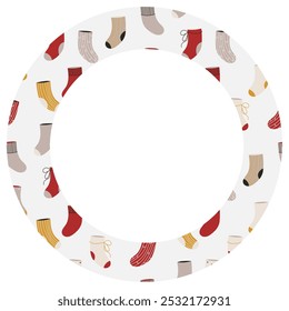 Round frame with with winter socks. Various Christmas socks with different patterns.