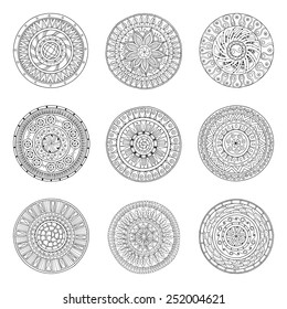 Round geometric ornaments set of had drawn doodle mandalas.Circle lace ornament, round ornamental geometric doily pattern collection. Black and white.