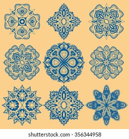 Round geometric ornaments set of had drawn doodle mandalas. Circle lace ornament, round ornamental geometric doily pattern collection. Blue and yellow