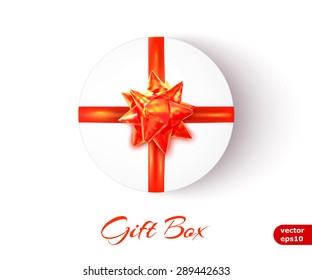 Round gift box with a red bow and ribbons. Vector illustration