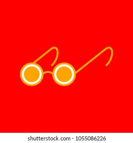 Round glasses for the blind. Vector. Orange icon with white holes if exist at red background. Isolated.
