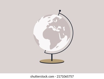 A round Globe on a metal stand, educational and travel concept