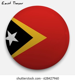 Round glossy Button with flag of East Timor with the reflection of light and shadow realistic. Icon of country.