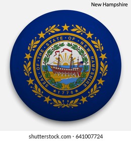 Round glossy Button with flag of New Hampshire, state of the USA, with the reflection of light and shadow realistic.