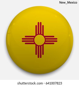 Round glossy Button with flag of New Mexico, state of the USA, with the reflection of light and shadow realistic.