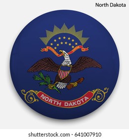 Round glossy Button with flag of North Dakota, state of the USA, with the reflection of light and shadow realistic.