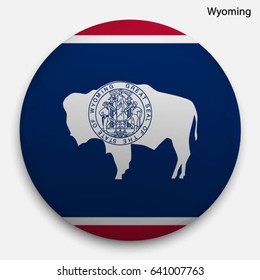 Round glossy Button with flag of Wyoming, state of the USA, with the reflection of light and shadow realistic.