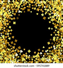 Round gold frame or border of random scatter clover leaves. Elegant St. Patricks day design for festive banner, greeting card, postcard, invitation, flyer, poster. Vector illustration.