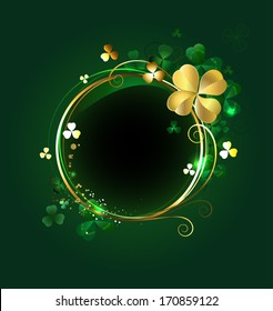 Round golden banner with shamrocks and clover with four leaves on green background.