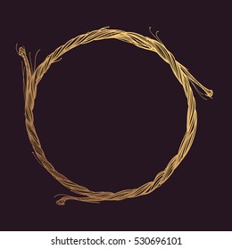 Round golden frame made of branches. Decorative element for design work in the boho style. Wreath on a dark background.