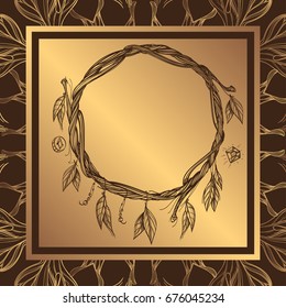 Round golden frame made of branches with feathers and leaves. Decorative element for design work in the boho style. Wreath on a dark background.