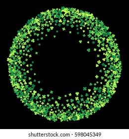 Round green frame, border or background of random scatter clover leaves. Elegant St. Patricks day design for festive banner, greeting card, postcard, flyer. Vector illustration.