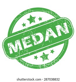 Round green rubber stamp with name Medan and stars, isolated on white