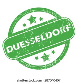 Round green rubber stamp with name Duesseldorf and stars, isolated on white