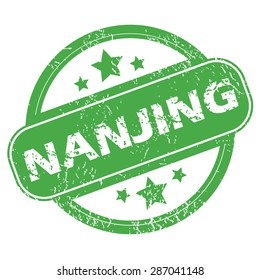 Round green rubber stamp with name Nanjing and stars, isolated on white