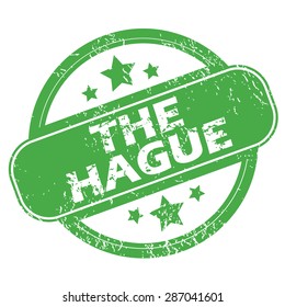 Round green rubber stamp with name The Hague and stars, isolated on white