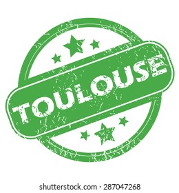 Round green rubber stamp with name Toulouse and stars, isolated on white